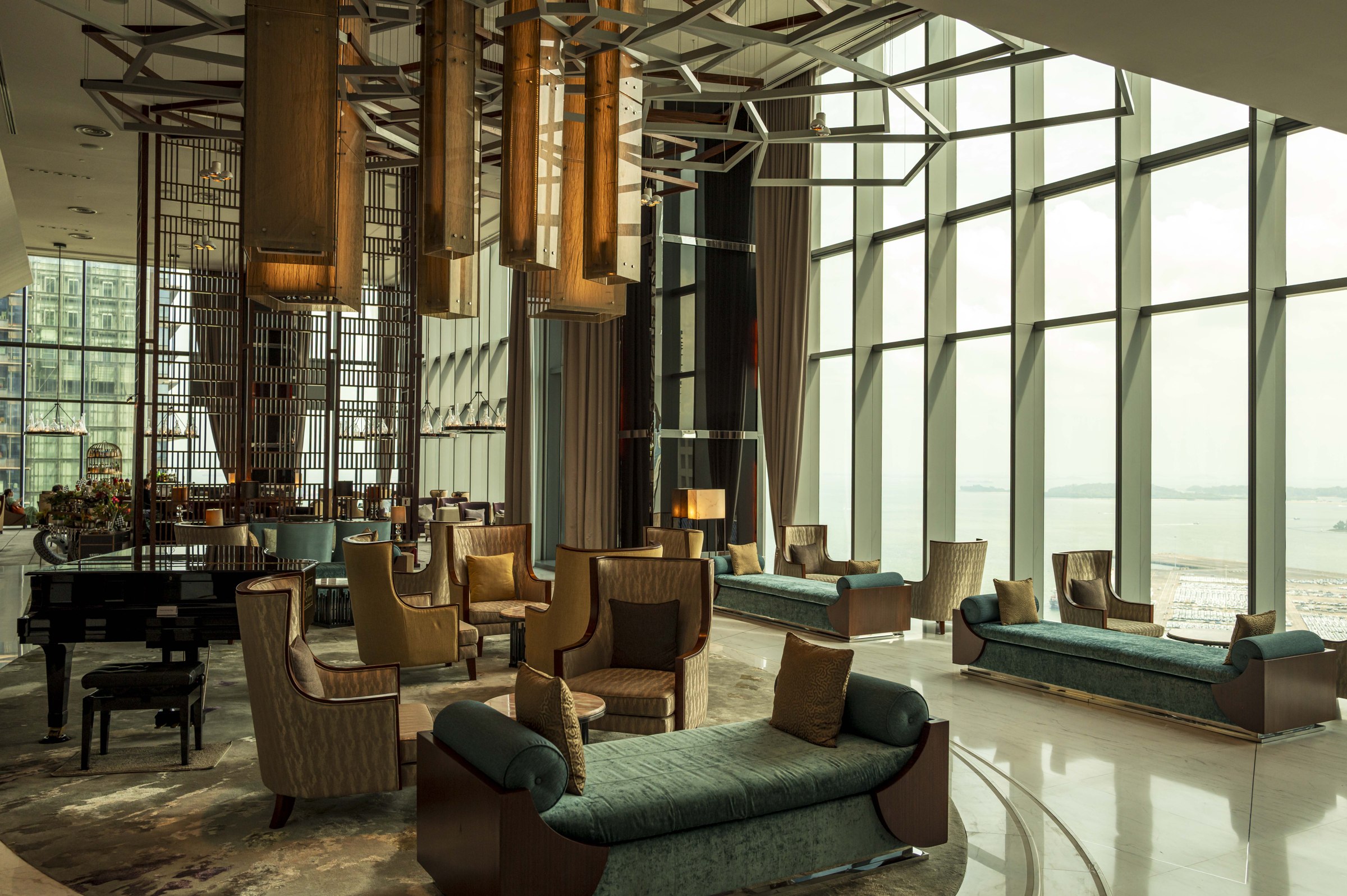Sunlit lounge with tall windows